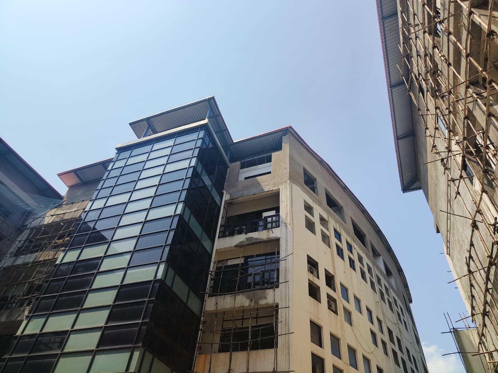 Extension of SOP building at SIES Campus — structural addition to existing structure, Nerul